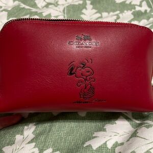 Red snoopy coach bag
